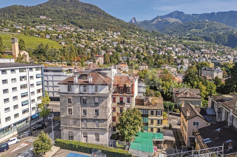 Immeuble de rendement : 2 surfaces commerciales et 4 appartements 3.5 pièces (10)