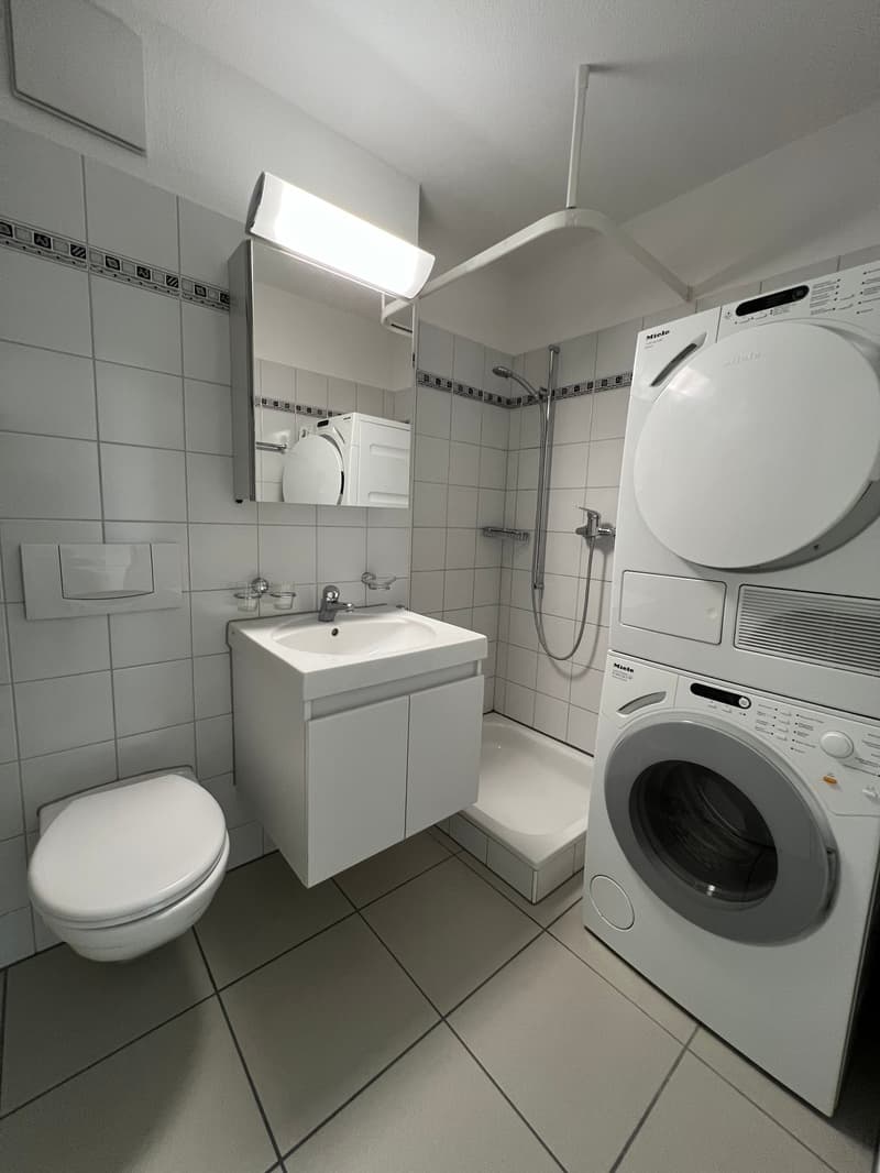 Appartement lumineux 2.5 pièces avec espace de séjour en centre-ville (5)