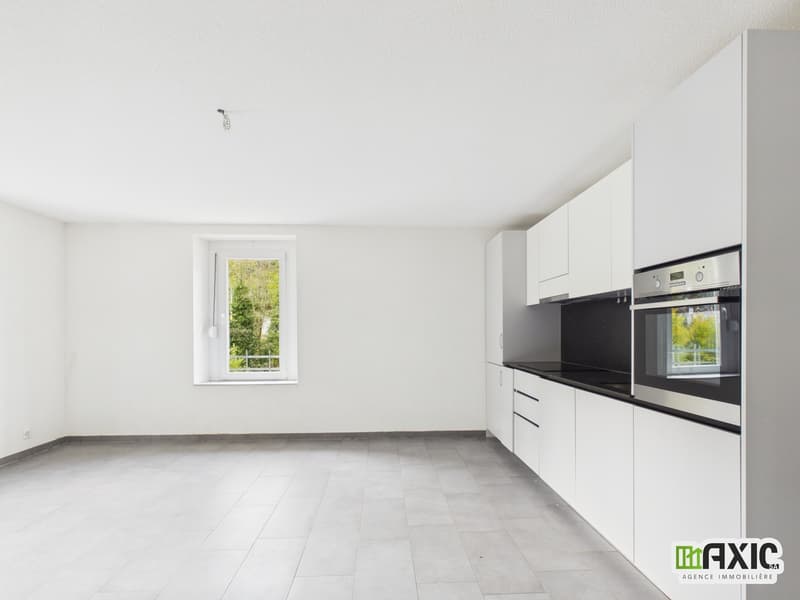Courrendlin : 4,5 pièces rénové au 1er étage avec jardin privatif (1)