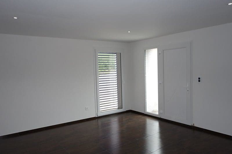 empty room, wooden floor, white walls, sliding glass door, double doors
