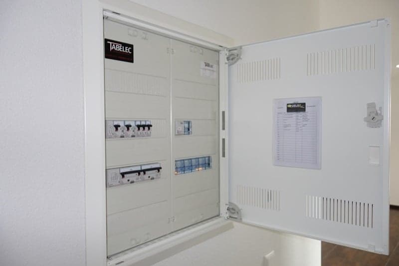 Electrical panel, circuit breakers, label and paper sheet