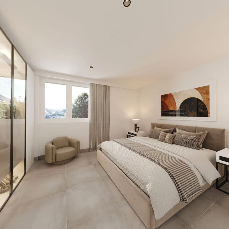 Spacious bedroom with large windows, beige furniture, modern decor, large bed, side tables, bedside lamps, picture frame on wall, large mirrors, tiled floor, comfortable armchair