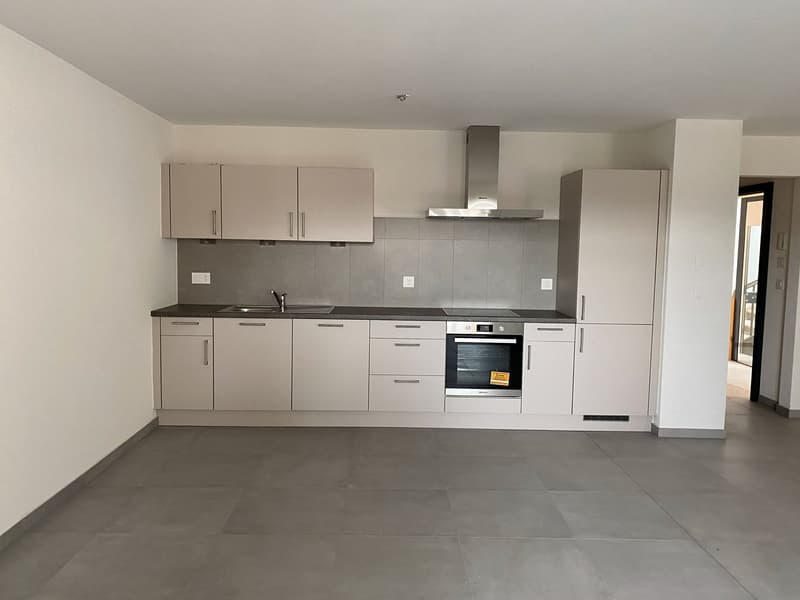 White cabinets, gray tiles, gas stove, electric oven, sink, power outlets
