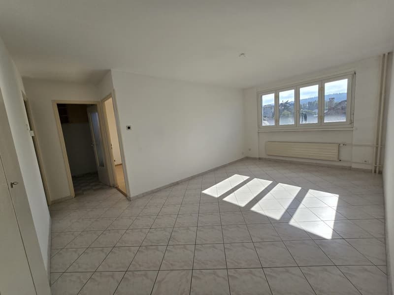large window, view, white tiled floor, empty room