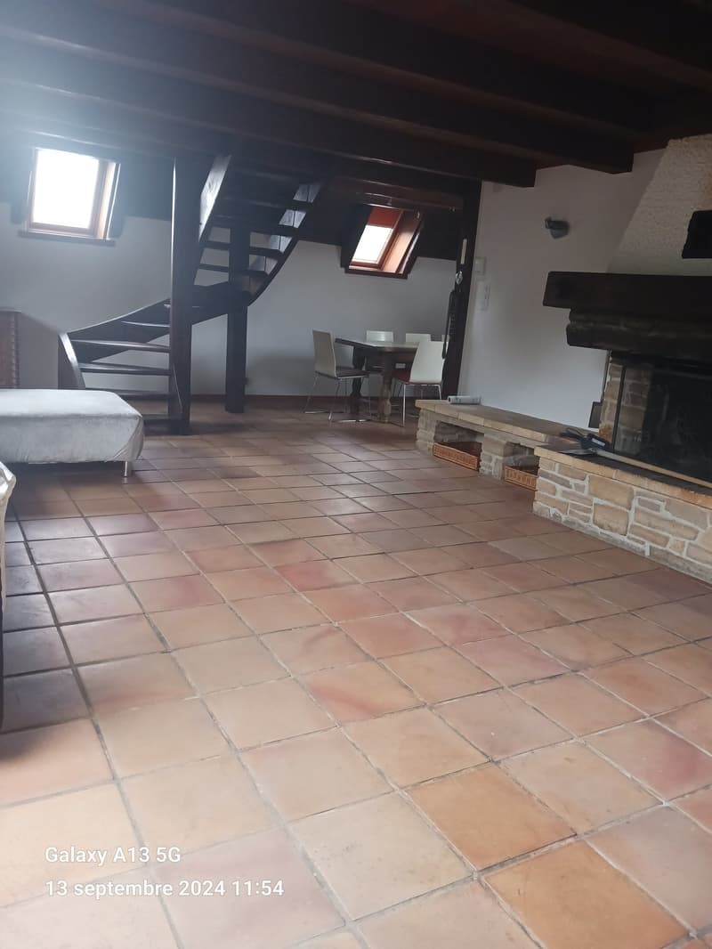 open space with wooden ceiling, spiral staircase, fireplace, dining table, chairs, couch, tiled floor