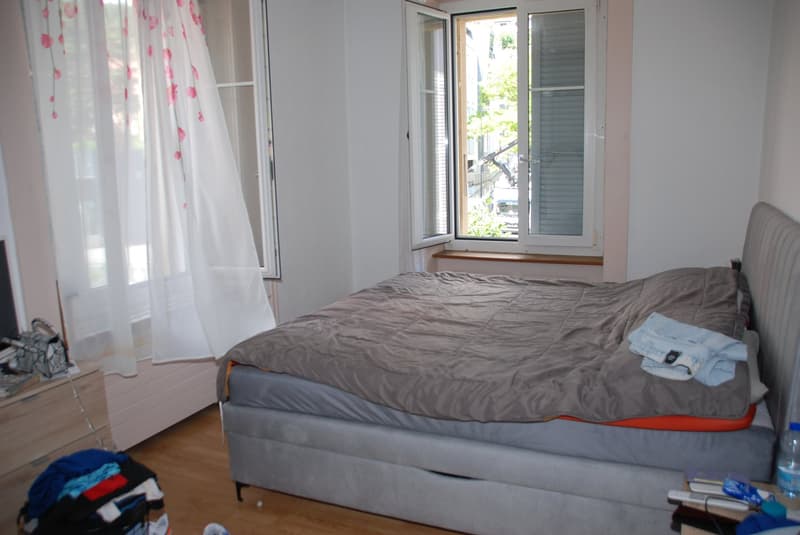 Mietshaus in Peseux mit 3 Wohnungen, Gewerberaum und Garagen (12)