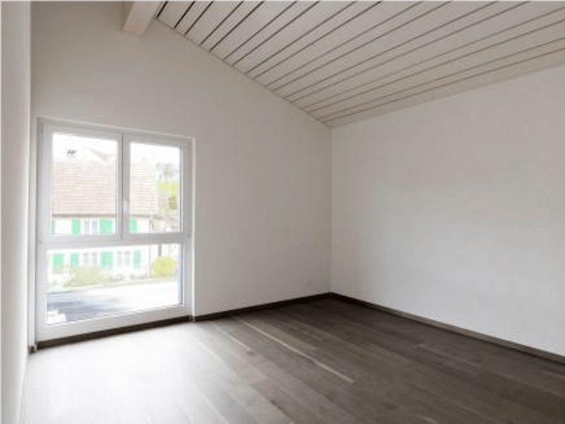 empty room, white walls, wooden floor, large window, view of outside