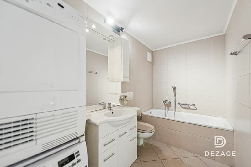 Appartement traversant aux volumes exceptionnels : 4 chambres et garage-box ! (8)