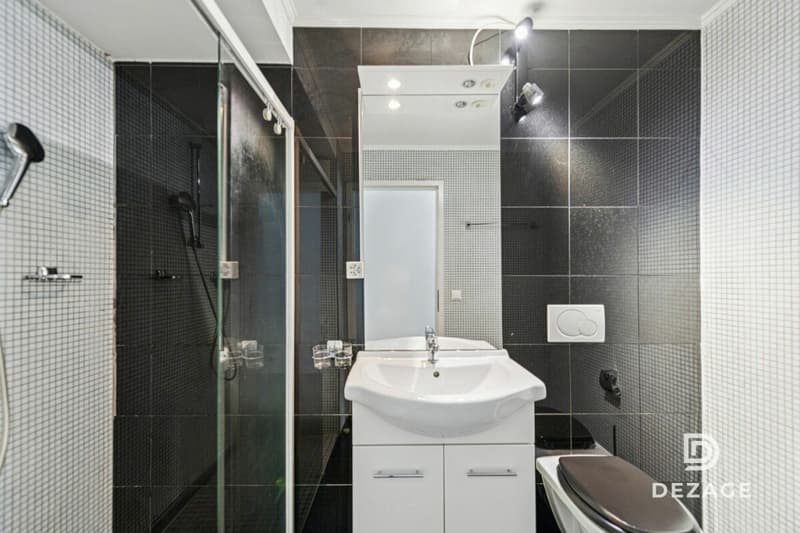 Appartement traversant aux volumes exceptionnels : 4 chambres et garage-box ! (11)