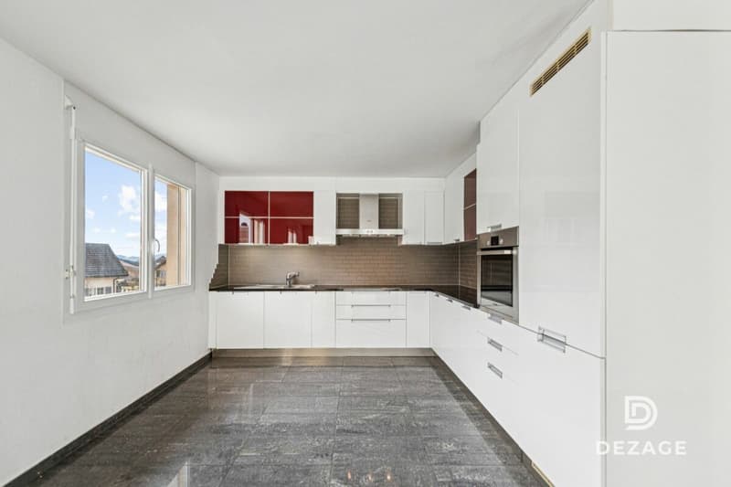 Appartement traversant aux volumes exceptionnels : 4 chambres et garage-box ! (4)