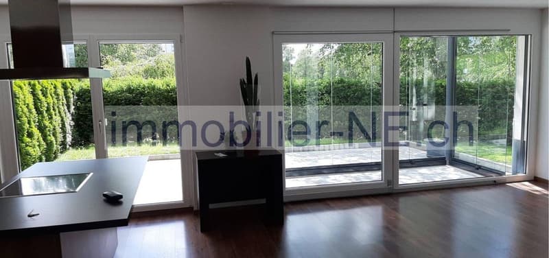 Bel appartement de 3,5 pièces, bénéficiant d'un jardin privatif et d'une place de parc intérieure (1)