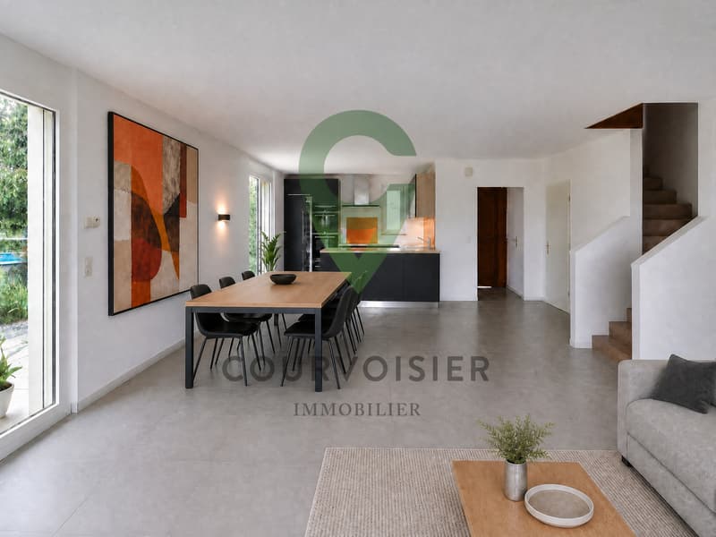 générée par l'IA - Non contractuel / the interior of a modern house with a large room that has a living room, dining room, and kitchen