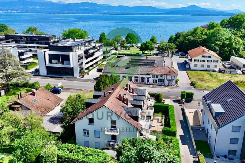 Ampio attico di 3,5 locali con bella vista libera sul lago (13)