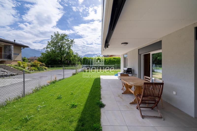Charming 3.5 room apartment with terrace, garden and two parking spaces (12)