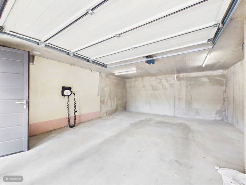 Garage avec borne de recharge