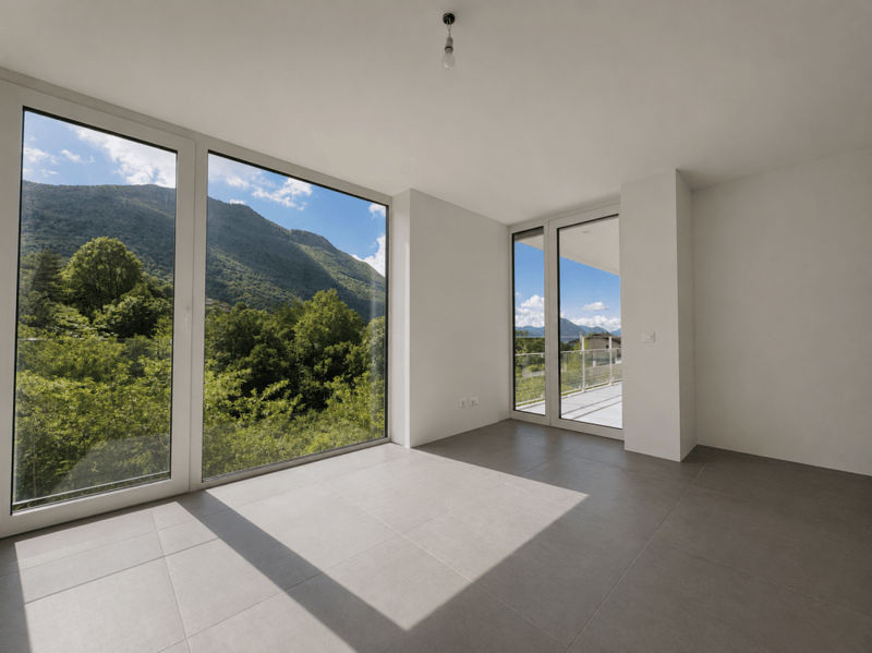 Appartamento con terrazza e splendida vista su Lugano e le montagne (1)