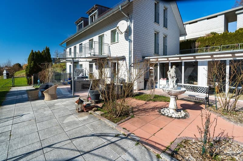 Einseitig angebautes Einfamilienhaus mit Wintergarten (1)