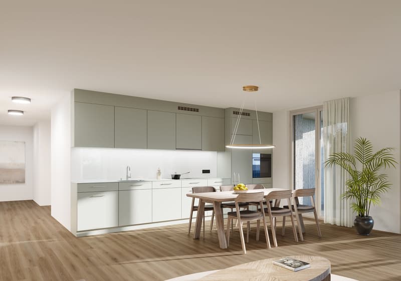 Modern kitchen with white cabinetry, wooden table, grey countertop, modern lighting, potted plant, hardwood flooring.