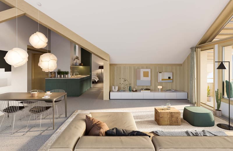 Spacious open-plan living area with a modern kitchen, dining table, and living room. The space features large windows, pendant lighting, a built-in entertainment unit, and a cozy sofa. The kitchen has a green island and appears to have a dishwasher.