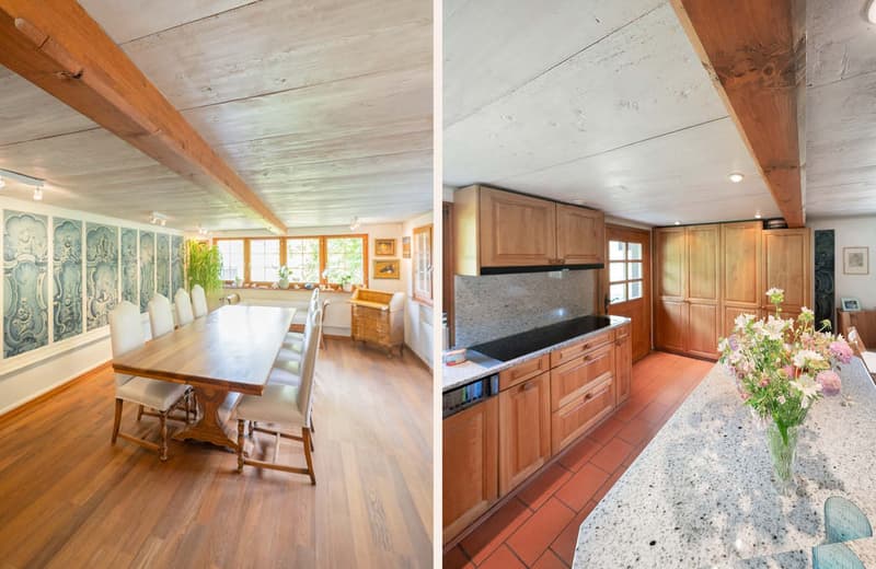 Dining room with wooden floor, long table, white chairs and mural. Kitchen with wooden cabinets, granite countertop, modern stove, and flowers.