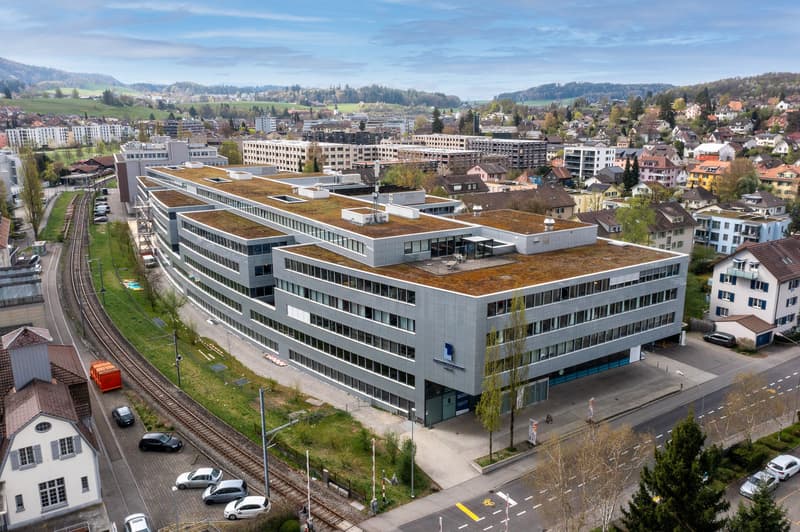 attachment:1c9a0b64 32d8 46af 8356 b2b17665b429:2604 liebefeld businesspark drone 92 Low
