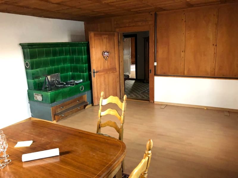 wooden floor, wooden walls, fireplace, dining table, chairs