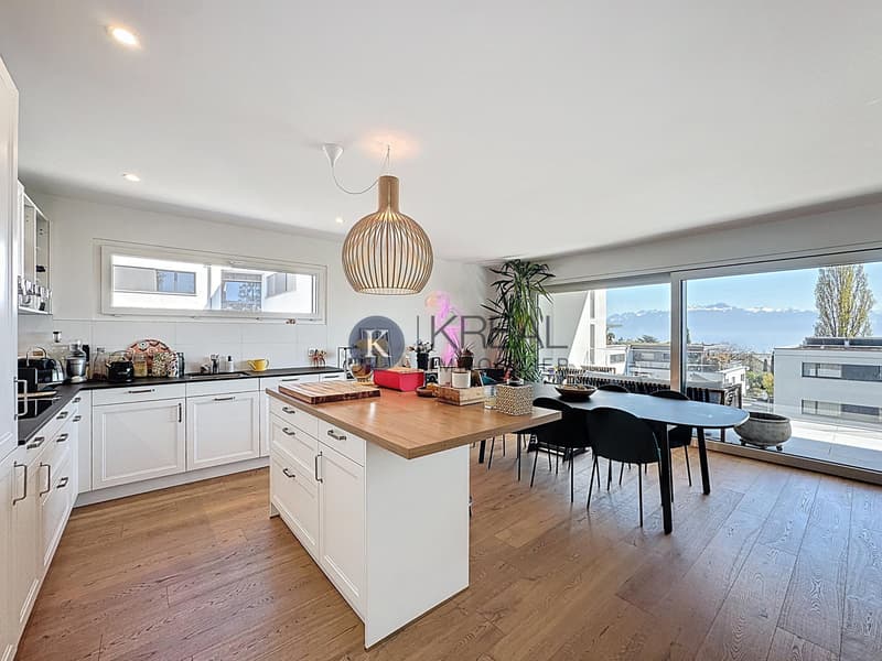 Ambiente di vita esclusivo: 4,5 locali moderni con balcone e vista eccezionale sul lago (4)