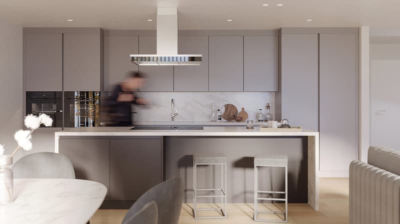 Kitchen with island, modern cabinets, marble countertops, gas range, microwave, refrigerator, dishwasher, wooden stools, dining table