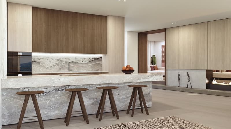 marble countertop, wooden cabinets, modern bar stools, fire pit in living room