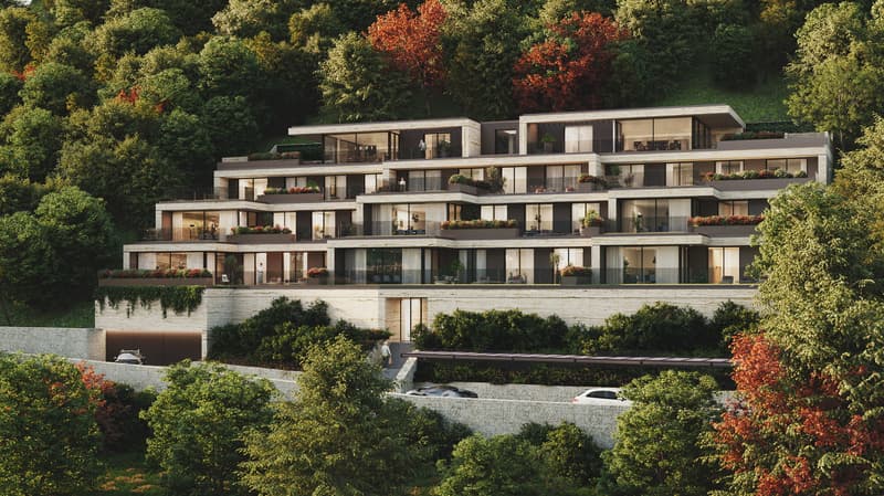 4 story building, white stone, multiple windows, terraces, garages