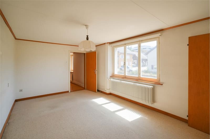 In Rheinnähe steuergünstig wohnen: Zweifamilienhaus mit Ausbaupotential (5)