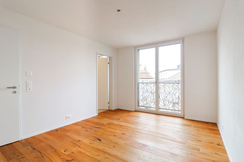 Exclusive 4.5-room apartment with a view & numerous garage spaces (6)