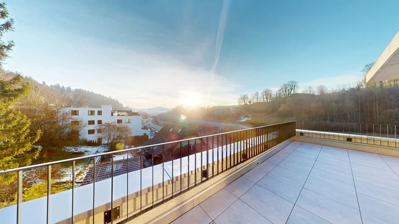 Modern design, large balcony, tiled floor, clear view of mountains and road
