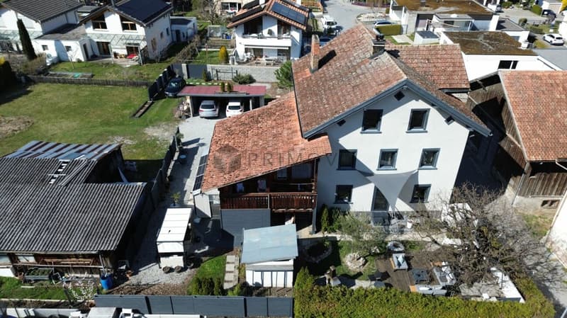 Maison multifamiliale charmante avec potentiel de développement dans un quartier calme de Rhäzüns (2)