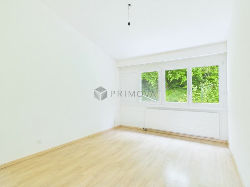 Maisonnette moderne de 5,5 pièces offrant un habitat exclusif sur trois étages comme une maison unifamiliale (9)