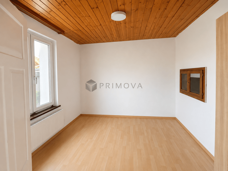 Proprietà redditizia con potenziale di sviluppo in una posizione residenziale centrale (2)