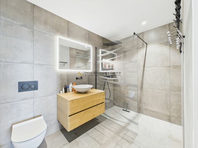 Un foyer avec ambition : appartement de jardin en construction neuve avec équipement premium (7)