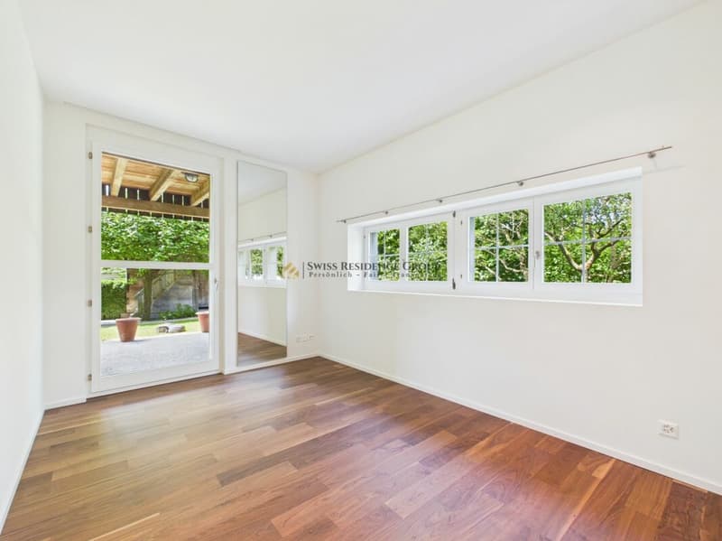 High-quality renovation with farmhouse charm, large veranda, and lake view (8)