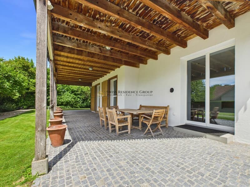High-quality renovation with farmhouse charm, large veranda, and lake view (2)