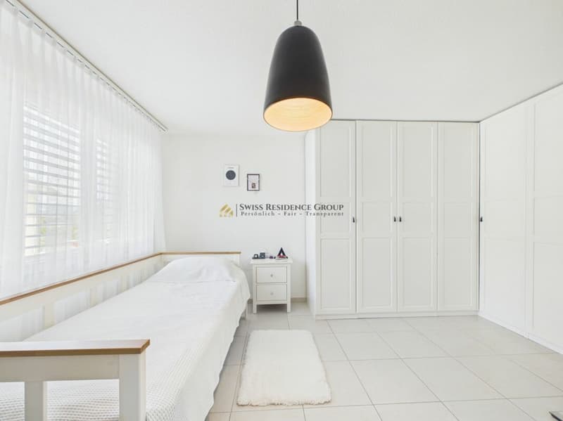 Modernes 6.5-Zimmer-Eckhaus mit sonnigem Garten in begehrter Wohnlage (10)