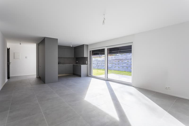 Appartamento di 4,5 locali al piano terra con parcheggio sotterraneo   LOT 1 (3)