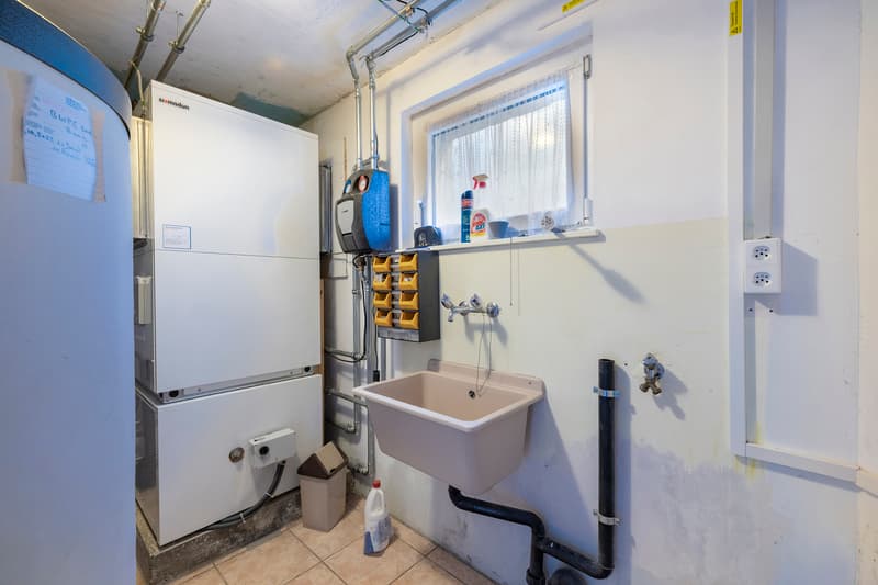 Villa di 6,5 locali con grande giardino, vista libera e potenziale locativo (13)