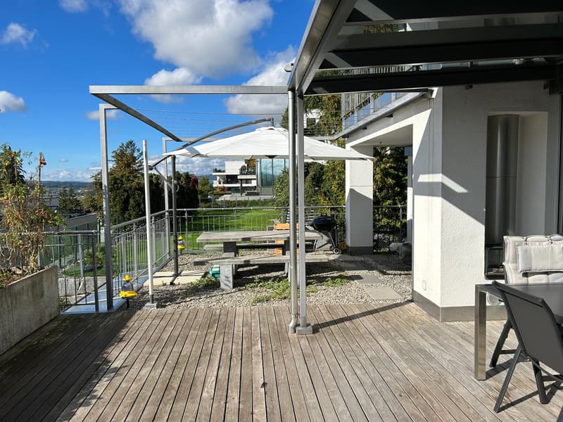 wooden deck, tables, chairs, umbrellas, BBQ