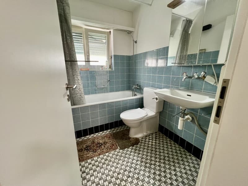 Casa multifamiliare completamente affittata con tre grandi appartamenti (6)