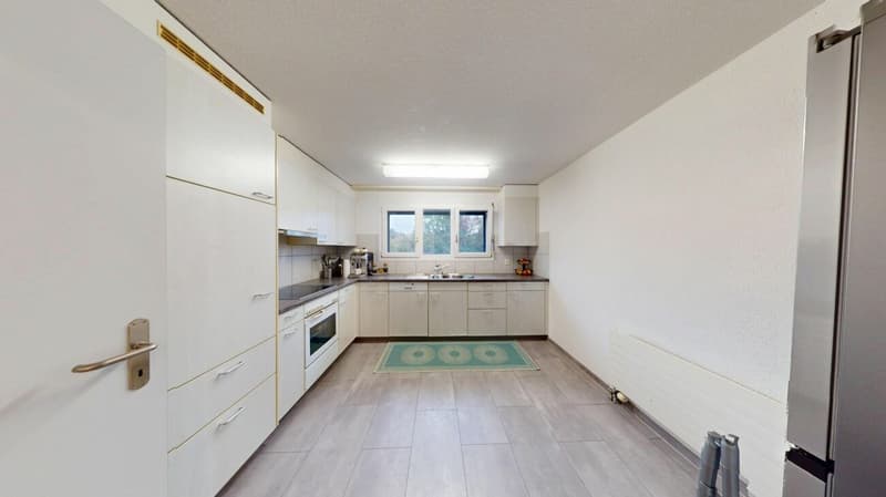 3.5 Zimmer Gartenwohnung mit sonnigem Sitzplatz und Blick ins Grüne (3)