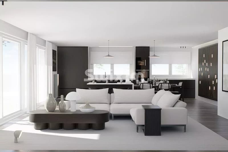 Un salon moderne lumineux avec un mobilier élégant et beaucoup de lumière naturelle.