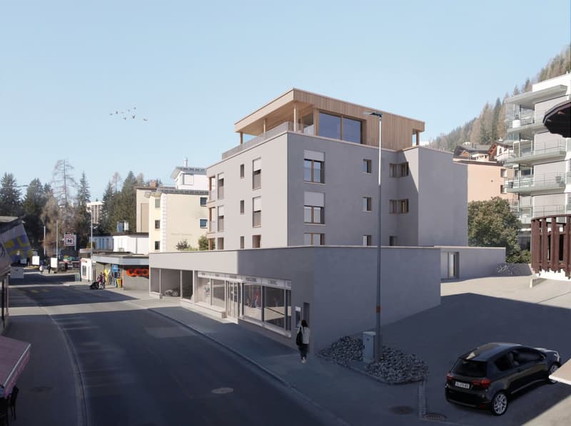 Multi-story residential building, gray exterior, modern architectural design, large windows, rooftop terrace, commercial ground floor, greenery, road, and parked car