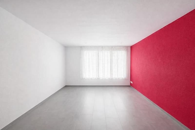 empty room, white and red walls, tile floor, white window with curtains