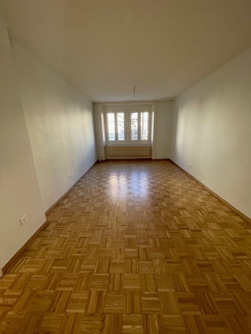 wooden parquet floor, windows, empty