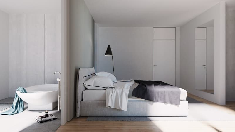 Spacious bedroom with gray walls, large windows, a gray upholstered bed, a freestanding bathtub, and a black floor lamp